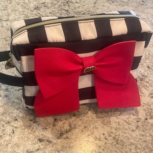 Betsey Johnson striped bag with bow.